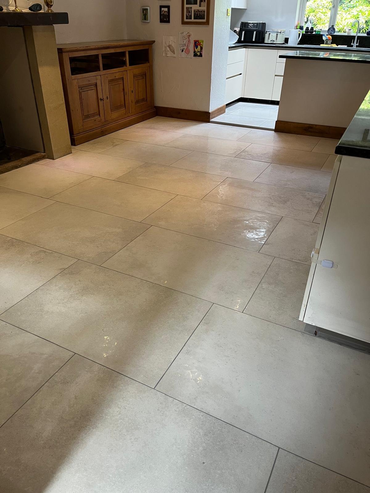 White brick-tiled WC with patterned floor